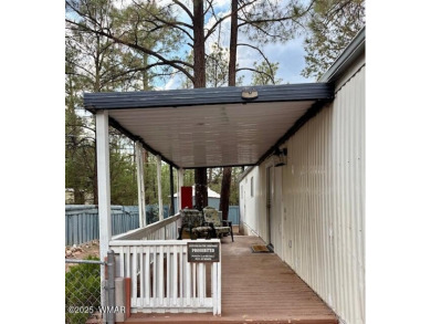 Check out this 2 bedroom, 1 bath home nestled in the tall pines on Bison Golf and Country Club in Arizona - for sale on GolfHomes.com, golf home, golf lot