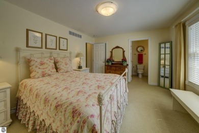 Tucked within the highly sought-after Harborage Park community on Ye Nyne Olde Holles Golf Club in Michigan - for sale on GolfHomes.com, golf home, golf lot