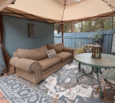 Check out this 2 bedroom, 1 bath home nestled in the tall pines on Bison Golf and Country Club in Arizona - for sale on GolfHomes.com, golf home, golf lot