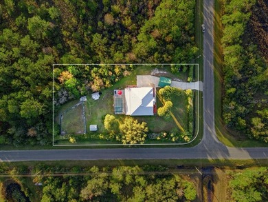 Picture mornings by your sparkling pool, coffee in hand on Wedgefield Golf Club in Florida - for sale on GolfHomes.com, golf home, golf lot