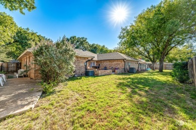 This four bedroom home is located on a quiet, tree lined on Bentwood Country Club in Texas - for sale on GolfHomes.com, golf home, golf lot