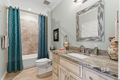 Meticulously maintained home overlooking #3 Lakes fairway and on Peninsula Golf and Racquet Club in Alabama - for sale on GolfHomes.com, golf home, golf lot