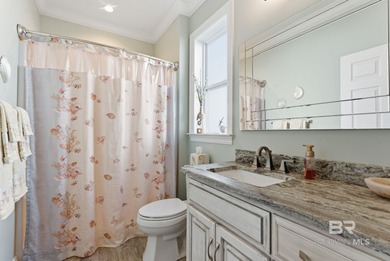 Meticulously maintained home overlooking #3 Lakes fairway and on Peninsula Golf and Racquet Club in Alabama - for sale on GolfHomes.com, golf home, golf lot