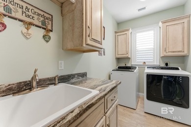 Meticulously maintained home overlooking #3 Lakes fairway and on Peninsula Golf and Racquet Club in Alabama - for sale on GolfHomes.com, golf home, golf lot