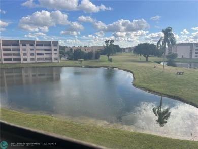 WOW!!! GORGEOUS 2 BEDROOM 2 BATHROOM CONDO (55+ COMMUNITY) ON on Sunrise Lakes Phase IV Golf Course in Florida - for sale on GolfHomes.com, golf home, golf lot