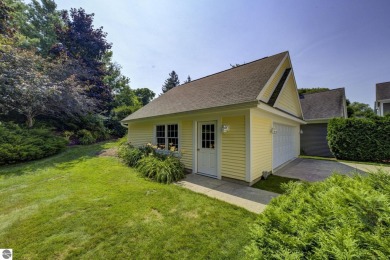 Tucked within the highly sought-after Harborage Park community on Ye Nyne Olde Holles Golf Club in Michigan - for sale on GolfHomes.com, golf home, golf lot