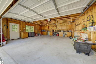 Tucked within the highly sought-after Harborage Park community on Ye Nyne Olde Holles Golf Club in Michigan - for sale on GolfHomes.com, golf home, golf lot