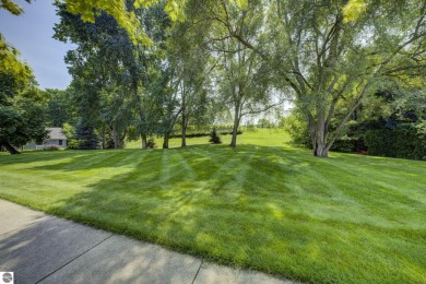Tucked within the highly sought-after Harborage Park community on Ye Nyne Olde Holles Golf Club in Michigan - for sale on GolfHomes.com, golf home, golf lot