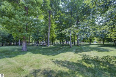 Tucked within the highly sought-after Harborage Park community on Ye Nyne Olde Holles Golf Club in Michigan - for sale on GolfHomes.com, golf home, golf lot