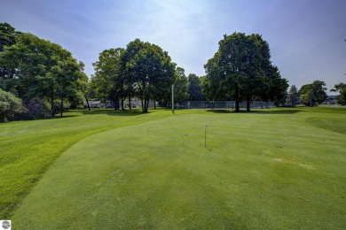 Tucked within the highly sought-after Harborage Park community on Ye Nyne Olde Holles Golf Club in Michigan - for sale on GolfHomes.com, golf home, golf lot