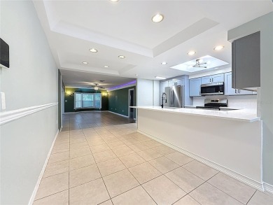 Discover this beautifully renovated 4-bedroom, 2-bathroom home on Temple Terrace Golf and Country Club in Florida - for sale on GolfHomes.com, golf home, golf lot