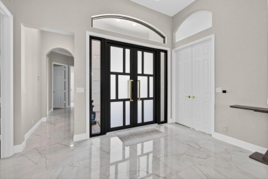 Set on a private cul-de-sac in the boutique Ironhorse community on Ironhorse Country Club in Florida - for sale on GolfHomes.com, golf home, golf lot