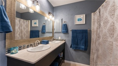 Welcome to Tan Tar A Estates! This 3 bedroom, 4 bathroom home is on The Oaks Golf Course in Missouri - for sale on GolfHomes.com, golf home, golf lot