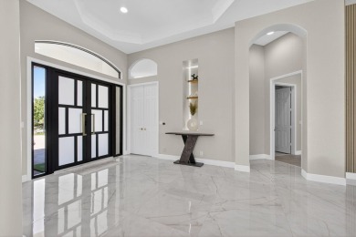 Set on a private cul-de-sac in the boutique Ironhorse community on Ironhorse Country Club in Florida - for sale on GolfHomes.com, golf home, golf lot