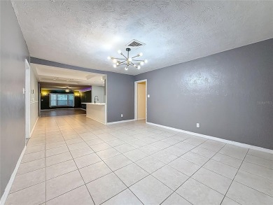 Discover this beautifully renovated 4-bedroom, 2-bathroom home on Temple Terrace Golf and Country Club in Florida - for sale on GolfHomes.com, golf home, golf lot