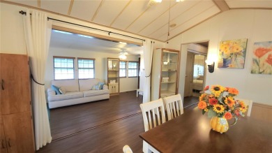 CHEERFUL HOME IN ACTIVE 55+ COMMUNITY! This one bed, two bath on River Run Golf Links in Florida - for sale on GolfHomes.com, golf home, golf lot