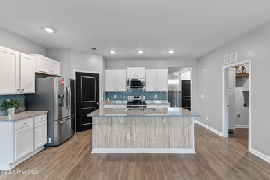 Looking for a move-in ready home with style, updates, and on Lennon Hills Golf Course in North Carolina - for sale on GolfHomes.com, golf home, golf lot