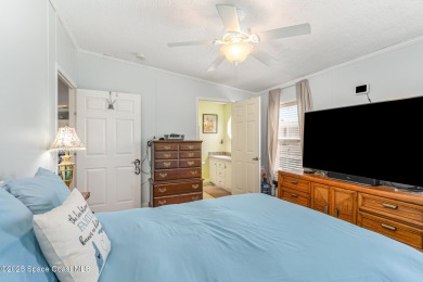 Welcome to your slice of paradise in Barefoot Bay! This charming on Barefoot Bay Golf Course in Florida - for sale on GolfHomes.com, golf home, golf lot