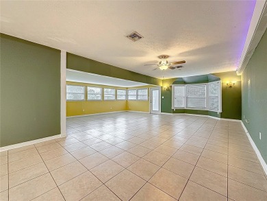 Discover this beautifully renovated 4-bedroom, 2-bathroom home on Temple Terrace Golf and Country Club in Florida - for sale on GolfHomes.com, golf home, golf lot