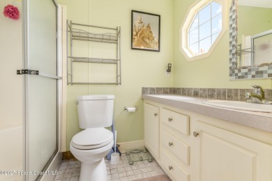 Welcome to your slice of paradise in Barefoot Bay! This charming on Barefoot Bay Golf Course in Florida - for sale on GolfHomes.com, golf home, golf lot