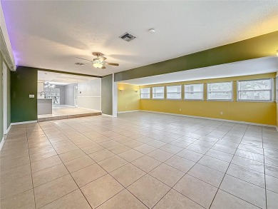 Discover this beautifully renovated 4-bedroom, 2-bathroom home on Temple Terrace Golf and Country Club in Florida - for sale on GolfHomes.com, golf home, golf lot