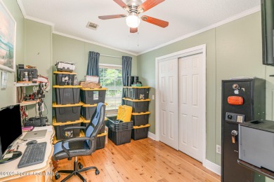 Welcome to your slice of paradise in Barefoot Bay! This charming on Barefoot Bay Golf Course in Florida - for sale on GolfHomes.com, golf home, golf lot