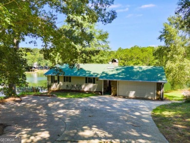 Stunning lake views in a gated community. This beautiful 3 on Fairfield Plantation Golf and Country Club in Georgia - for sale on GolfHomes.com, golf home, golf lot