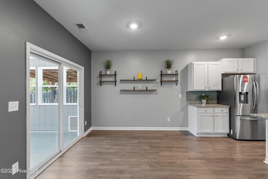 Looking for a move-in ready home with style, updates, and on Lennon Hills Golf Course in North Carolina - for sale on GolfHomes.com, golf home, golf lot