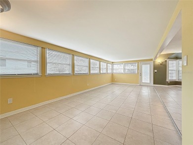 Discover this beautifully renovated 4-bedroom, 2-bathroom home on Temple Terrace Golf and Country Club in Florida - for sale on GolfHomes.com, golf home, golf lot
