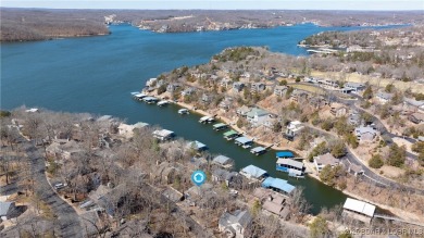 Welcome to Tan Tar A Estates! This 3 bedroom, 4 bathroom home is on The Oaks Golf Course in Missouri - for sale on GolfHomes.com, golf home, golf lot