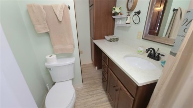 CHEERFUL HOME IN ACTIVE 55+ COMMUNITY! This one bed, two bath on River Run Golf Links in Florida - for sale on GolfHomes.com, golf home, golf lot