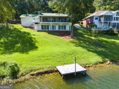 Stunning lake views in a gated community. This beautiful 3 on Fairfield Plantation Golf and Country Club in Georgia - for sale on GolfHomes.com, golf home, golf lot