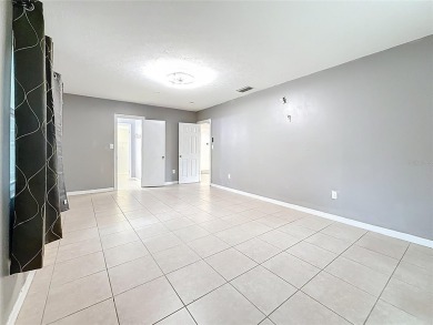 Discover this beautifully renovated 4-bedroom, 2-bathroom home on Temple Terrace Golf and Country Club in Florida - for sale on GolfHomes.com, golf home, golf lot
