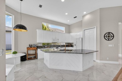 Set on a private cul-de-sac in the boutique Ironhorse community on Ironhorse Country Club in Florida - for sale on GolfHomes.com, golf home, golf lot