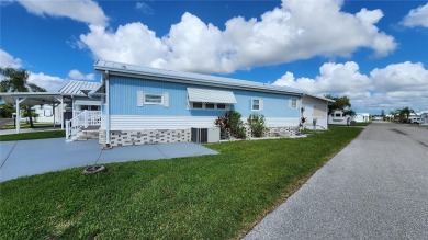 CHEERFUL HOME IN ACTIVE 55+ COMMUNITY! This one bed, two bath on River Run Golf Links in Florida - for sale on GolfHomes.com, golf home, golf lot