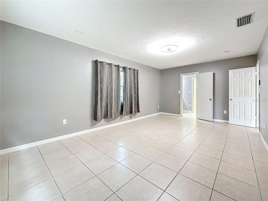 Discover this beautifully renovated 4-bedroom, 2-bathroom home on Temple Terrace Golf and Country Club in Florida - for sale on GolfHomes.com, golf home, golf lot