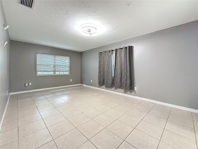 Discover this beautifully renovated 4-bedroom, 2-bathroom home on Temple Terrace Golf and Country Club in Florida - for sale on GolfHomes.com, golf home, golf lot