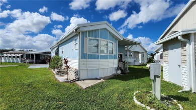 CHEERFUL HOME IN ACTIVE 55+ COMMUNITY! This one bed, two bath on River Run Golf Links in Florida - for sale on GolfHomes.com, golf home, golf lot