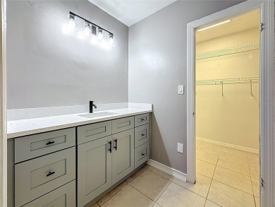 Discover this beautifully renovated 4-bedroom, 2-bathroom home on Temple Terrace Golf and Country Club in Florida - for sale on GolfHomes.com, golf home, golf lot