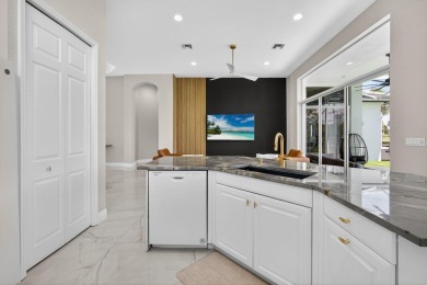 Set on a private cul-de-sac in the boutique Ironhorse community on Ironhorse Country Club in Florida - for sale on GolfHomes.com, golf home, golf lot