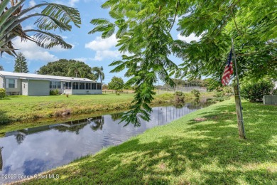Welcome to your slice of paradise in Barefoot Bay! This charming on Barefoot Bay Golf Course in Florida - for sale on GolfHomes.com, golf home, golf lot