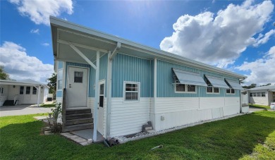 CHEERFUL HOME IN ACTIVE 55+ COMMUNITY! This one bed, two bath on River Run Golf Links in Florida - for sale on GolfHomes.com, golf home, golf lot