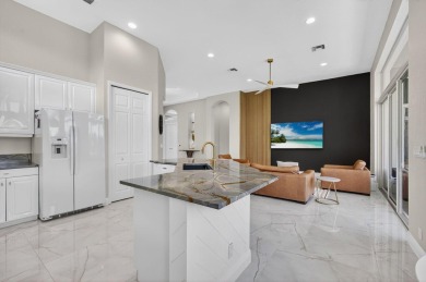 Set on a private cul-de-sac in the boutique Ironhorse community on Ironhorse Country Club in Florida - for sale on GolfHomes.com, golf home, golf lot