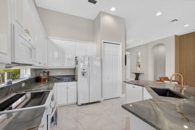 Set on a private cul-de-sac in the boutique Ironhorse community on Ironhorse Country Club in Florida - for sale on GolfHomes.com, golf home, golf lot