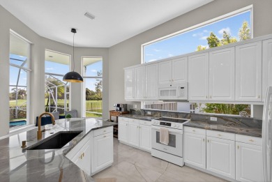 Set on a private cul-de-sac in the boutique Ironhorse community on Ironhorse Country Club in Florida - for sale on GolfHomes.com, golf home, golf lot