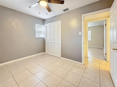 Discover this beautifully renovated 4-bedroom, 2-bathroom home on Temple Terrace Golf and Country Club in Florida - for sale on GolfHomes.com, golf home, golf lot