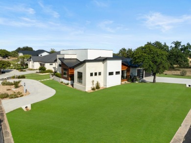 This exquisite Hill Country modern in exclusive Applehead sits on Apple Rock Golf Course - Horseshoe Bay in Texas - for sale on GolfHomes.com, golf home, golf lot