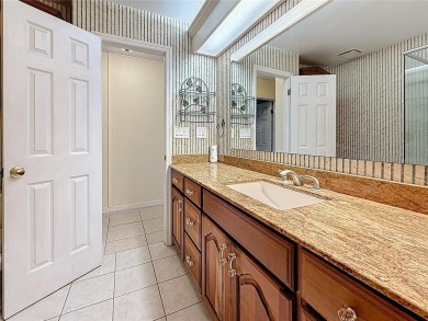 Discover this beautifully renovated 4-bedroom, 2-bathroom home on Temple Terrace Golf and Country Club in Florida - for sale on GolfHomes.com, golf home, golf lot