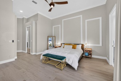 Set on a private cul-de-sac in the boutique Ironhorse community on Ironhorse Country Club in Florida - for sale on GolfHomes.com, golf home, golf lot