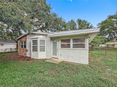 Discover this beautifully renovated 4-bedroom, 2-bathroom home on Temple Terrace Golf and Country Club in Florida - for sale on GolfHomes.com, golf home, golf lot